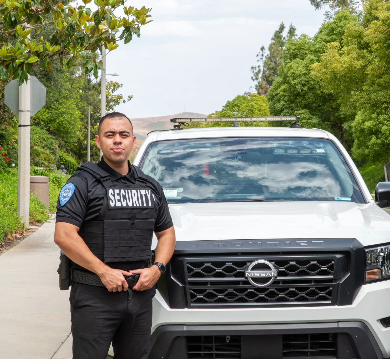 gloabl security concepts officer standing outside truck